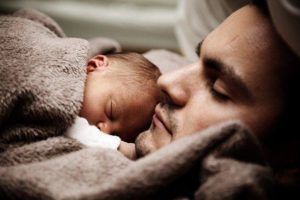 man and baby who may need an Injury lawsuit funding provider