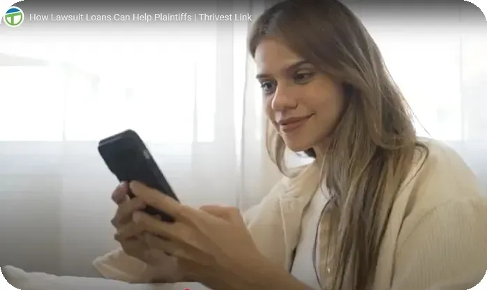 a woman applying for pre-settlement funding on her mobile phone
