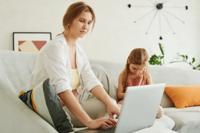 a woman watching legal funding videos online
